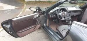 9977